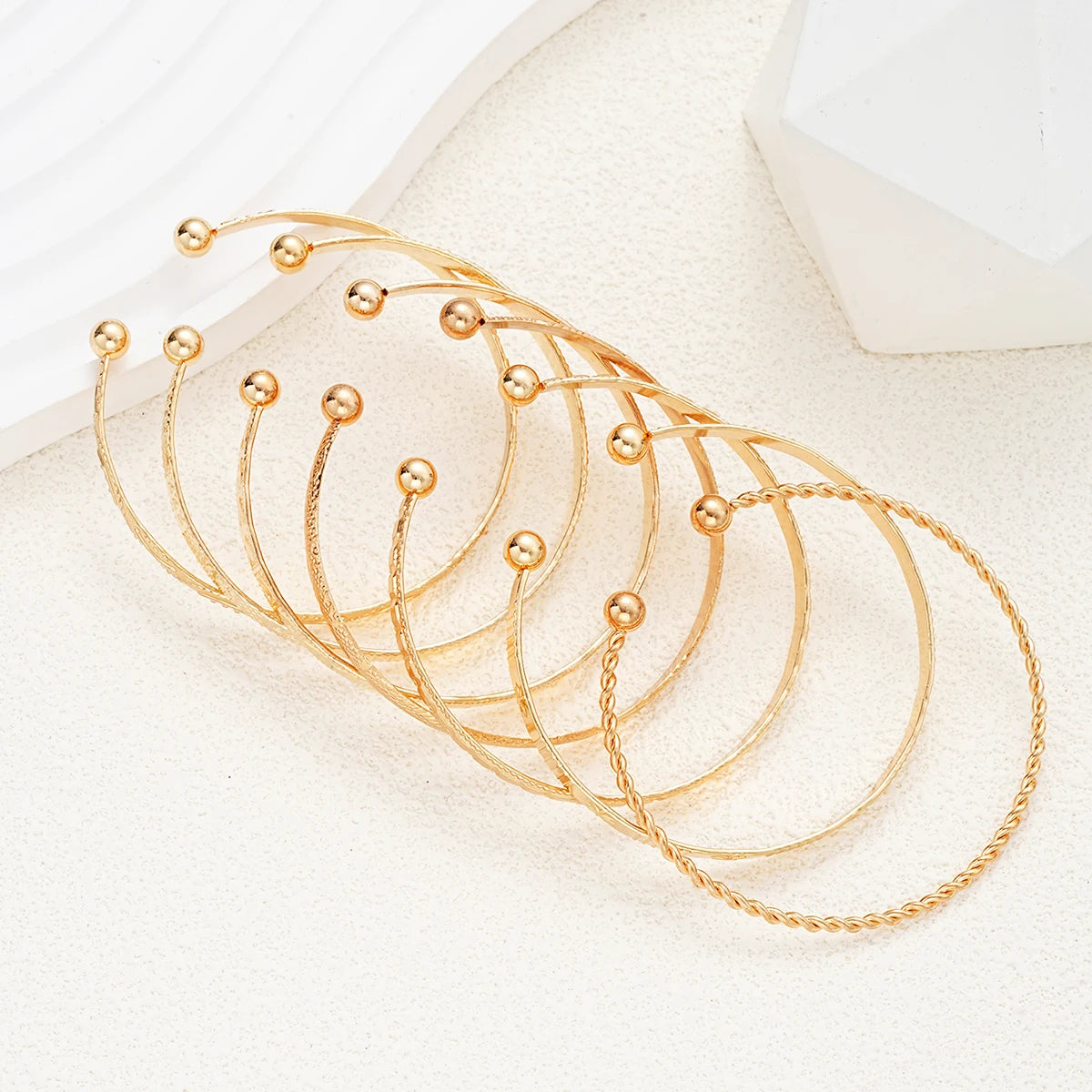Golden Rebel Stackable Bracelet Set – 7 Piece Cuff Bangle Collection