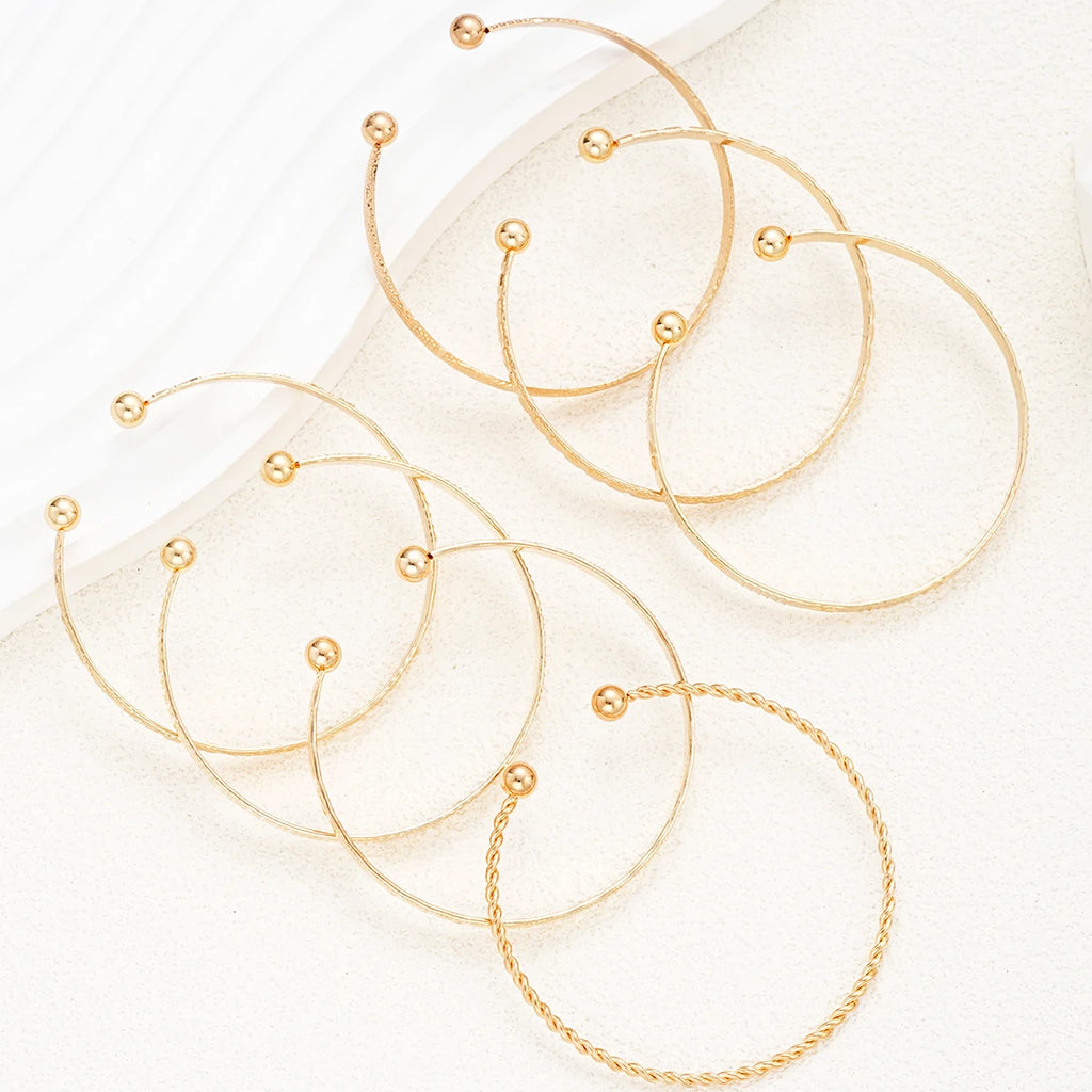 Golden Rebel Stackable Bracelet Set – 7 Piece Cuff Bangle Collection