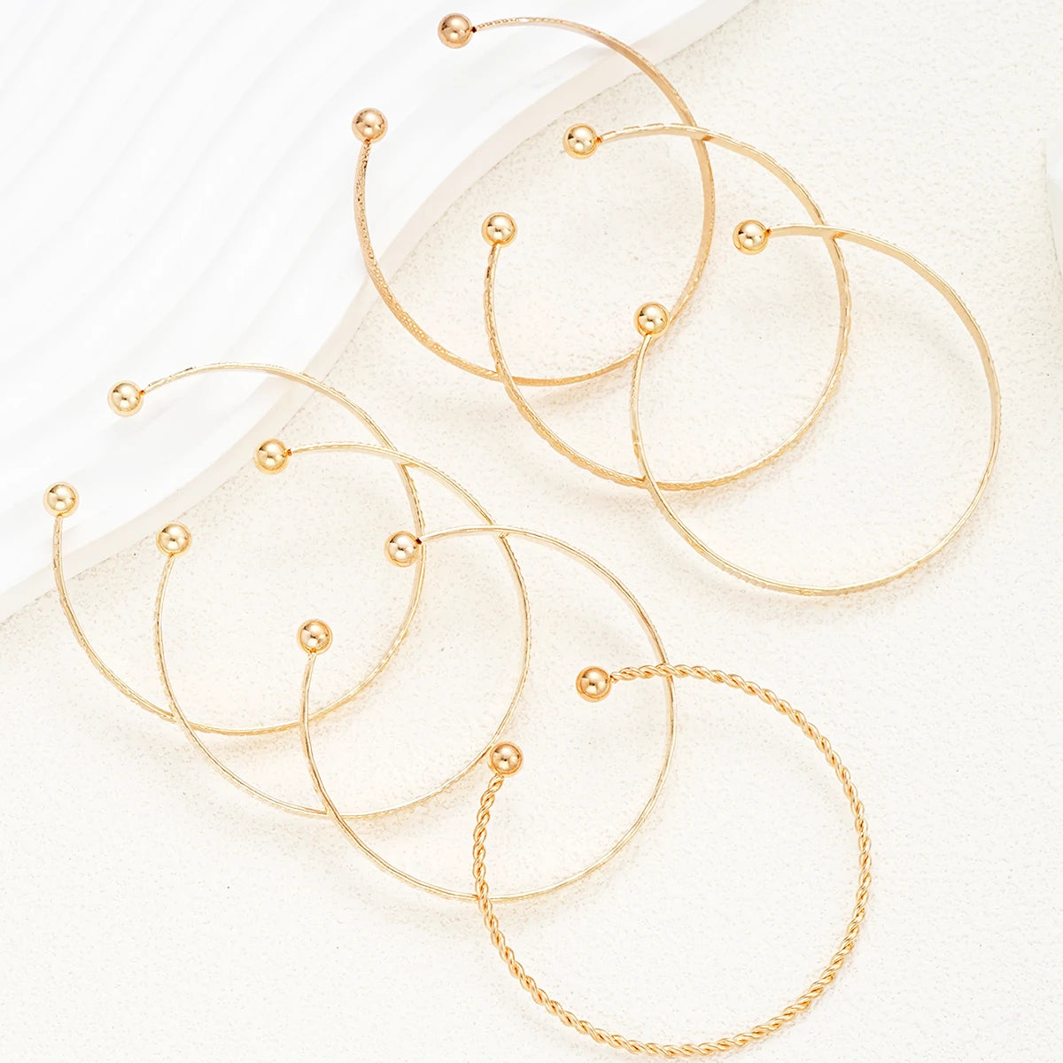 Golden Rebel Stackable Bracelet Set – 7 Piece Cuff Bangle Collection