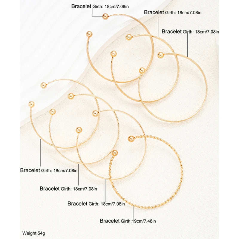 Golden Rebel Stackable Bracelet Set – 7 Piece Cuff Bangle Collection