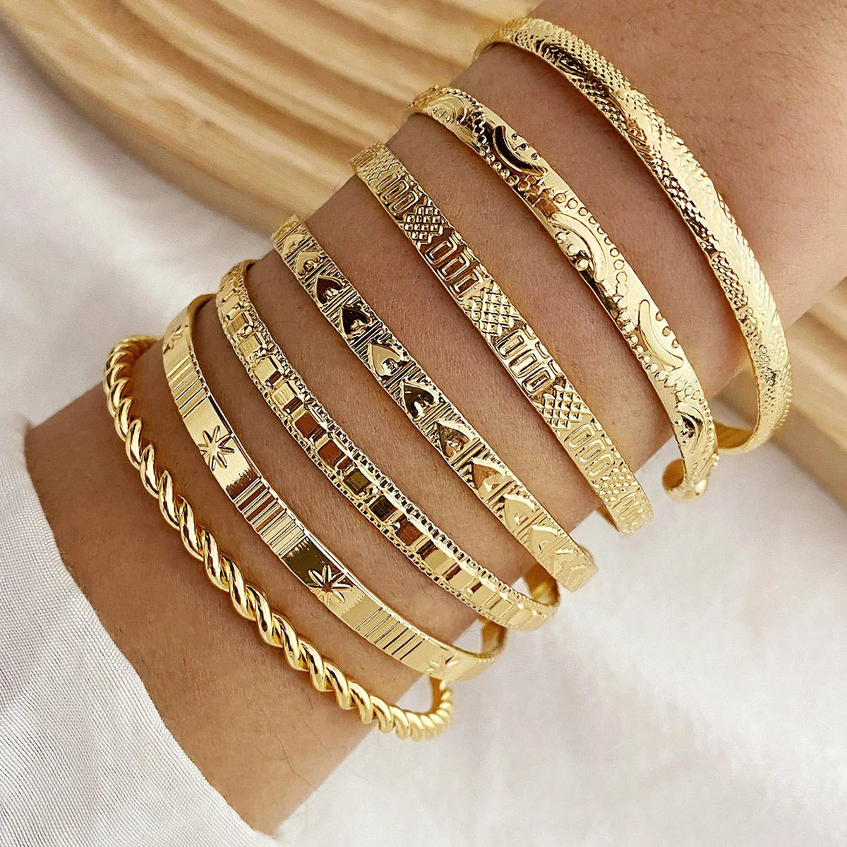 Golden Rebel Stackable Bracelet Set – 7 Piece Cuff Bangle Collection