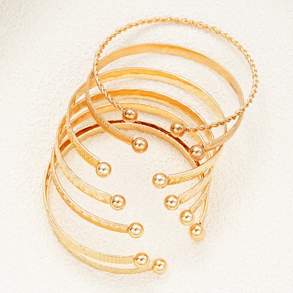 Golden Rebel Stackable Bracelet Set – 7 Piece Cuff Bangle Collection